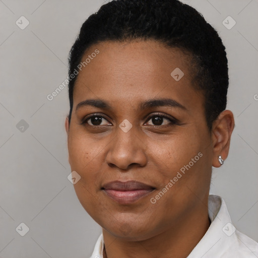 Joyful black young-adult female with short  black hair and brown eyes