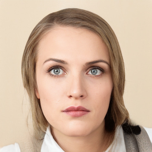 Neutral white young-adult female with medium  brown hair and green eyes