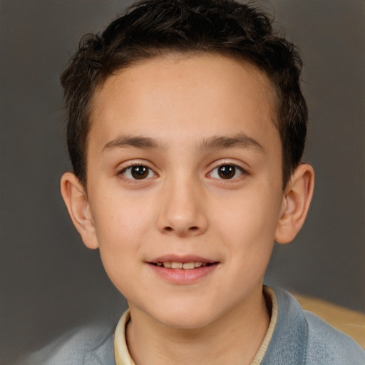 Joyful white child male with short  brown hair and brown eyes