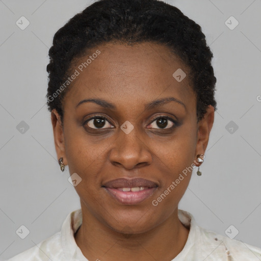 Joyful black young-adult female with short  brown hair and brown eyes