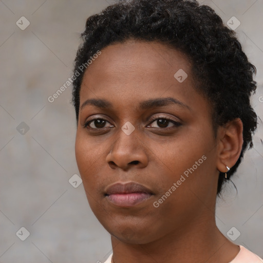 Neutral black young-adult female with short  black hair and brown eyes