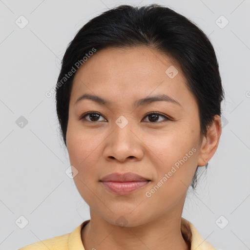 Joyful asian young-adult female with medium  brown hair and brown eyes