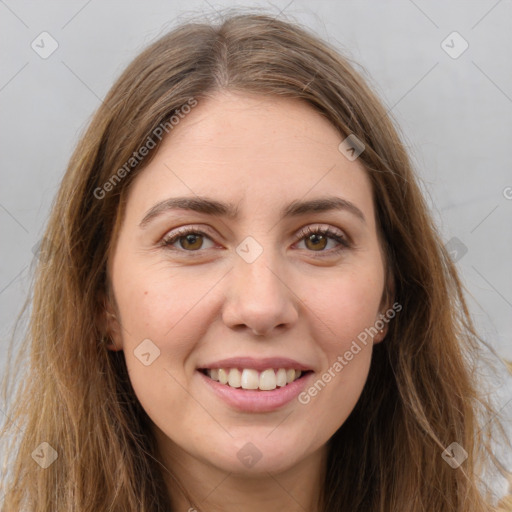 Joyful white young-adult female with long  brown hair and green eyes