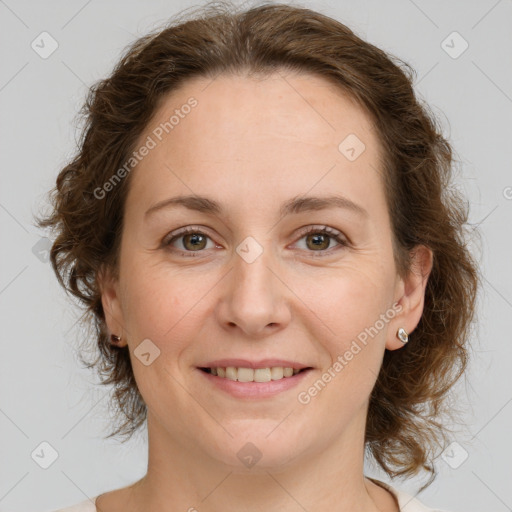 Joyful white young-adult female with medium  brown hair and green eyes