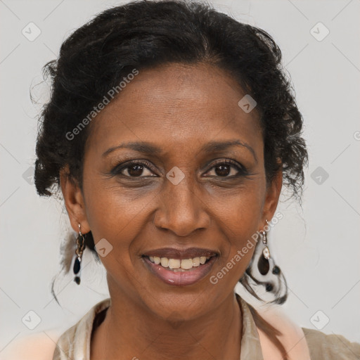 Joyful black adult female with medium  brown hair and brown eyes