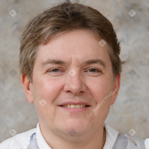 Joyful white adult male with short  brown hair and grey eyes