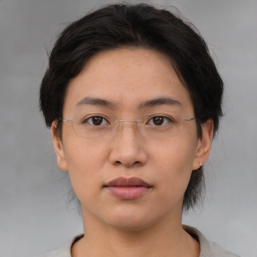 Neutral white young-adult female with medium  brown hair and brown eyes