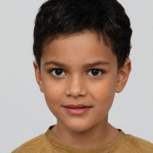 Joyful white child male with short  brown hair and brown eyes