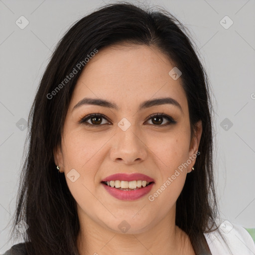 Joyful latino young-adult female with long  brown hair and brown eyes