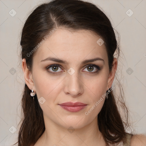 Joyful white young-adult female with long  brown hair and brown eyes