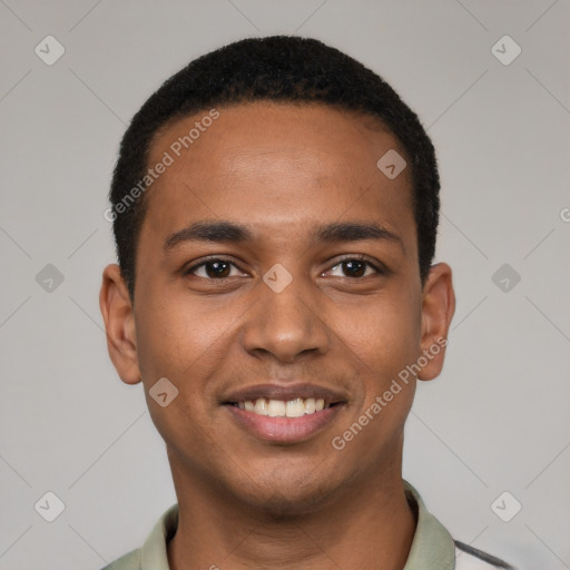 Joyful black young-adult male with short  black hair and brown eyes