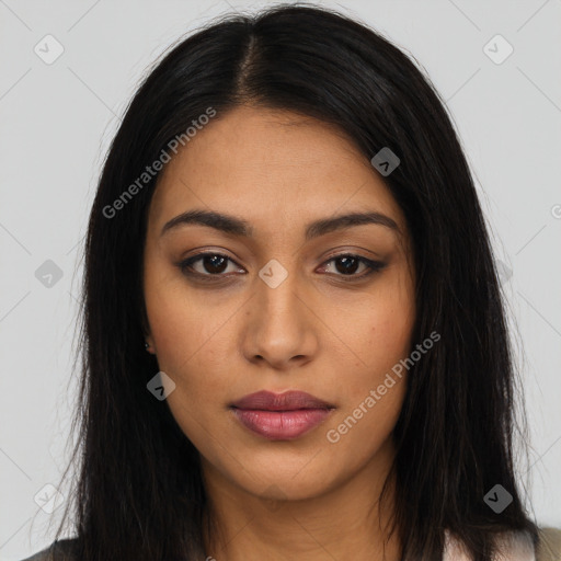 Joyful latino young-adult female with long  brown hair and brown eyes