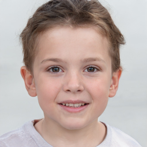 Joyful white child female with short  brown hair and grey eyes