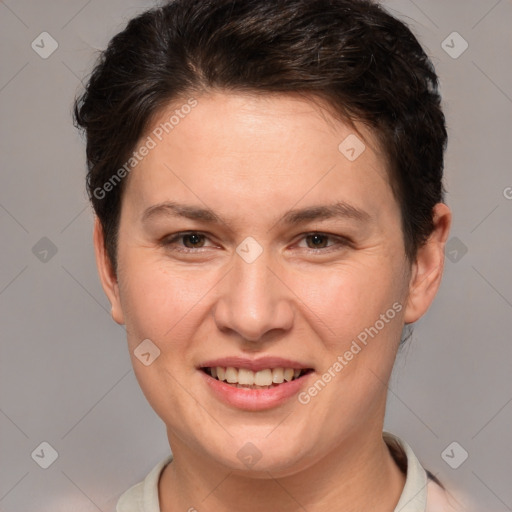 Joyful white adult female with short  brown hair and brown eyes