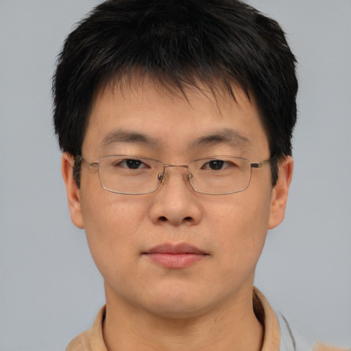 Neutral asian young-adult male with short  brown hair and brown eyes