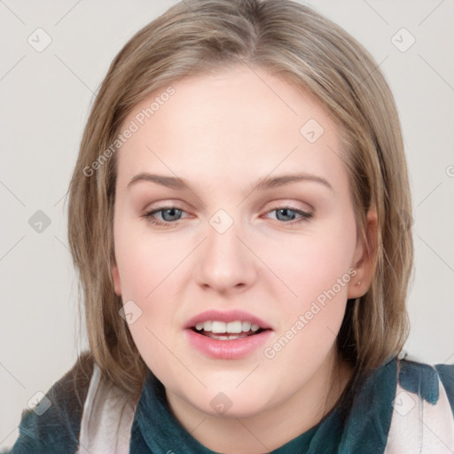 Joyful white young-adult female with medium  brown hair and blue eyes