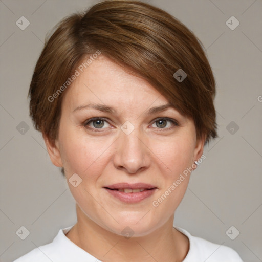 Joyful white adult female with short  brown hair and grey eyes