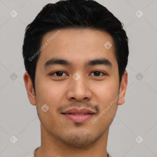 Joyful asian young-adult male with short  black hair and brown eyes