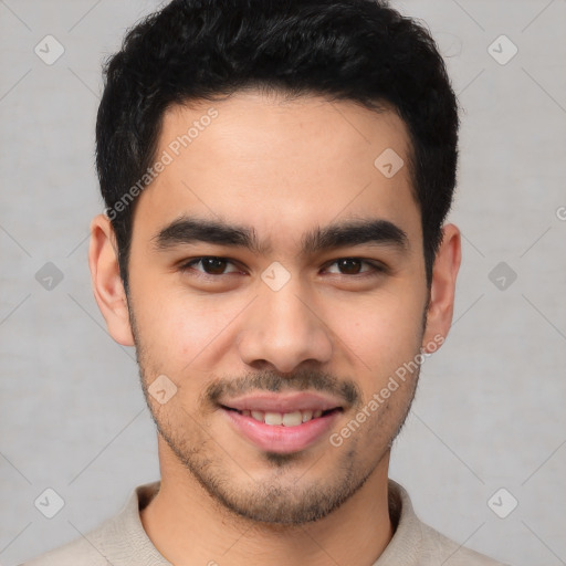 Joyful latino young-adult male with short  brown hair and brown eyes