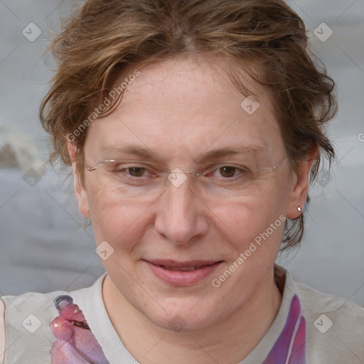 Joyful white adult female with medium  brown hair and blue eyes