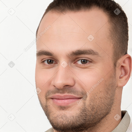 Joyful white young-adult male with short  brown hair and brown eyes