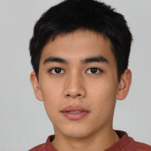 Neutral asian young-adult male with short  brown hair and brown eyes