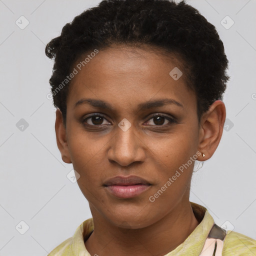 Joyful black young-adult female with short  black hair and brown eyes