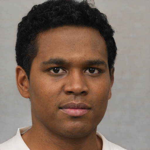 Neutral black young-adult male with short  brown hair and brown eyes