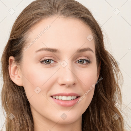 Joyful white young-adult female with long  brown hair and blue eyes