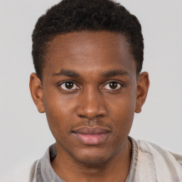 Neutral black young-adult male with short  brown hair and brown eyes