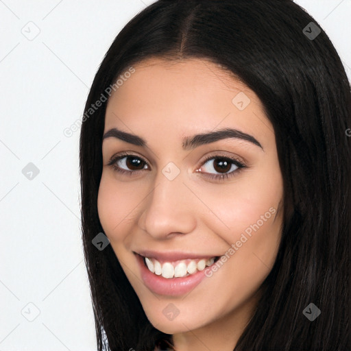 Joyful white young-adult female with long  black hair and brown eyes