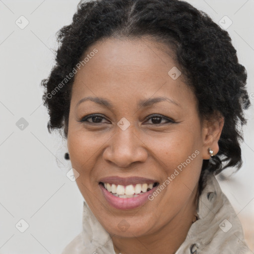 Joyful latino adult female with short  brown hair and brown eyes