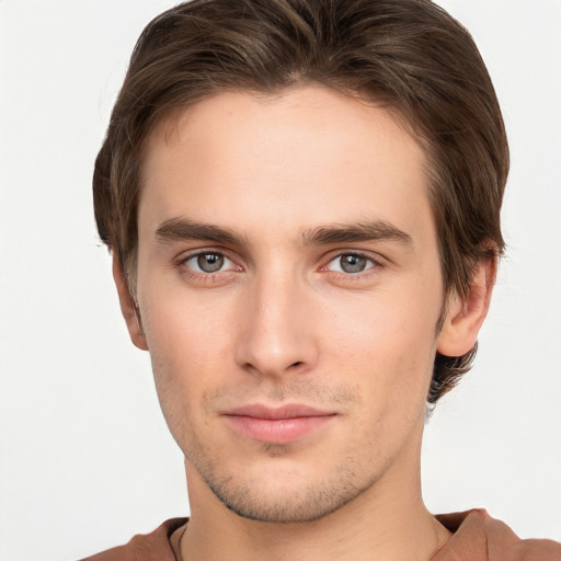 Neutral white young-adult male with short  brown hair and brown eyes