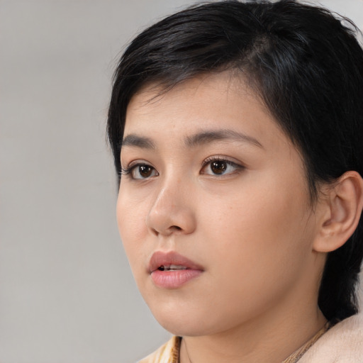 Neutral white young-adult female with medium  black hair and brown eyes