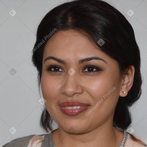 Joyful latino young-adult female with medium  brown hair and brown eyes