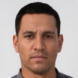 Neutral white adult male with short  black hair and brown eyes