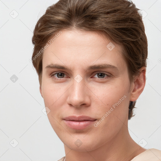 Joyful white young-adult female with short  brown hair and grey eyes