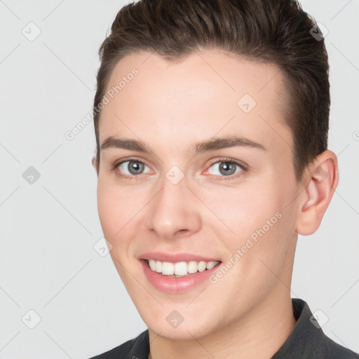 Joyful white young-adult female with short  brown hair and brown eyes