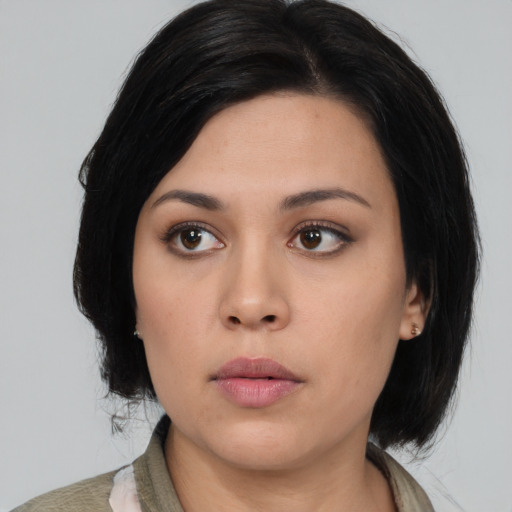 Neutral asian young-adult female with medium  black hair and brown eyes