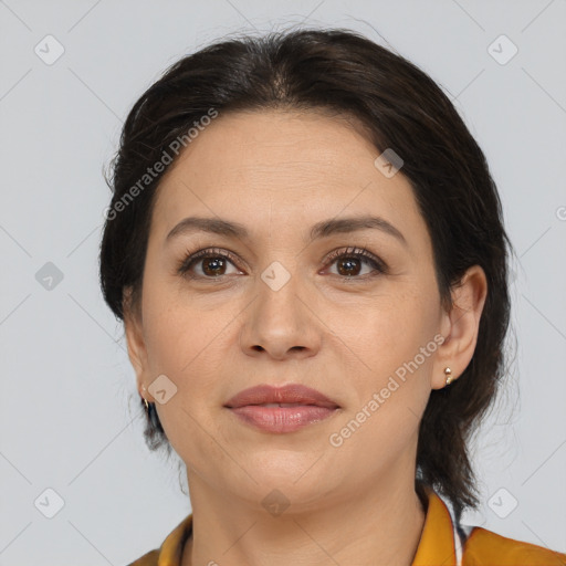 Joyful white adult female with medium  brown hair and brown eyes