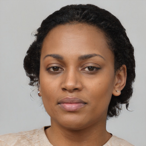Neutral black young-adult female with short  black hair and brown eyes