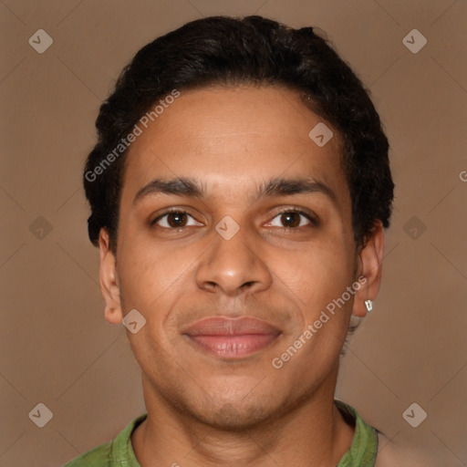 Joyful latino young-adult male with short  brown hair and brown eyes