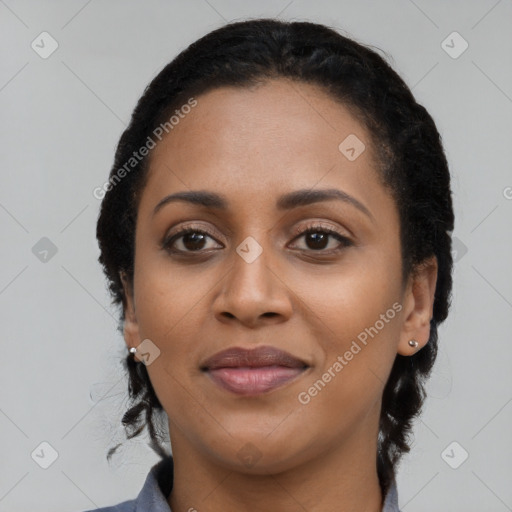 Joyful latino young-adult female with long  black hair and brown eyes