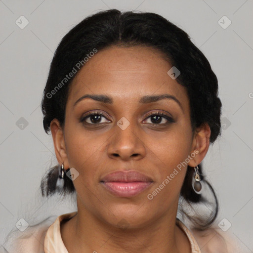 Joyful black young-adult female with medium  brown hair and brown eyes