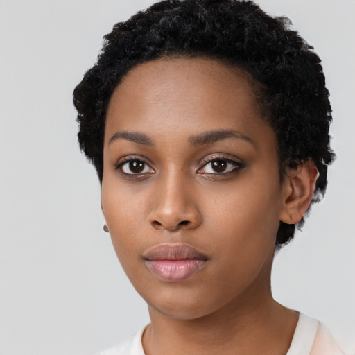 Neutral black young-adult female with short  black hair and brown eyes