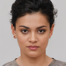 Neutral white young-adult female with short  brown hair and brown eyes