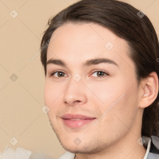 Joyful white young-adult male with medium  brown hair and brown eyes