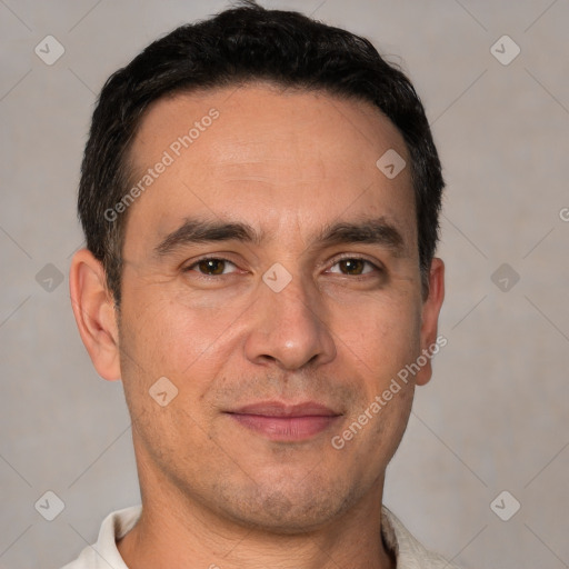 Joyful white adult male with short  brown hair and brown eyes