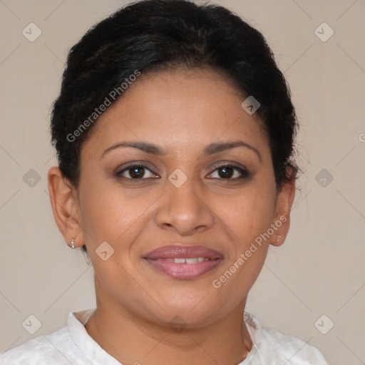 Joyful latino young-adult female with short  brown hair and brown eyes