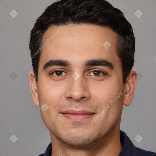 Joyful white young-adult male with short  black hair and brown eyes